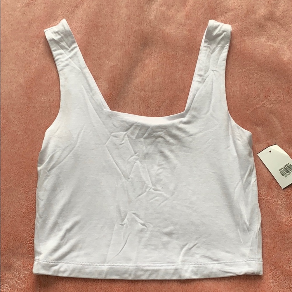 white dry goods crop top